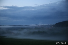 Jemelle dans la brume